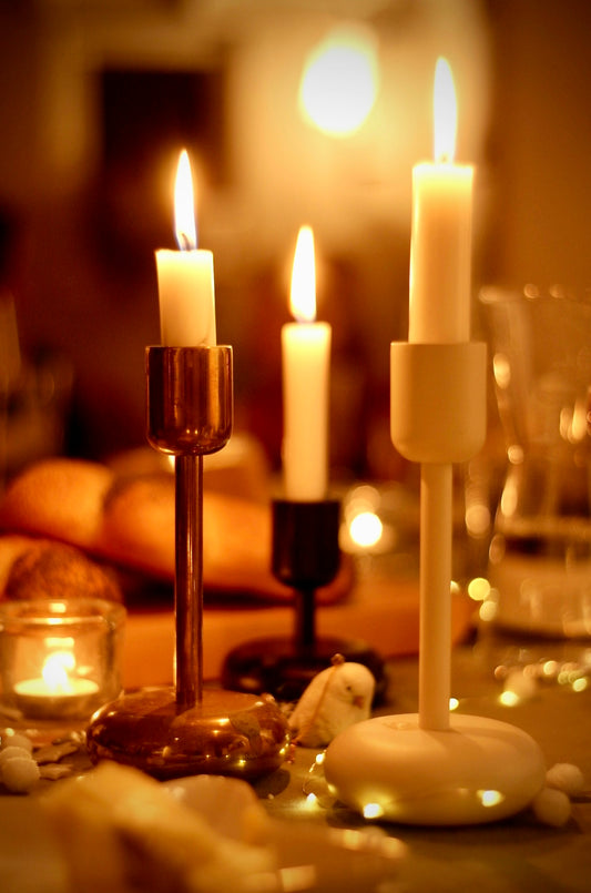 a close up of candles on a table